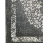 Carpets A beautiful, intricately designed carpet with a rich, dark color