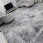 Carpets A living room with a large, intricately patterned carpet