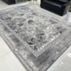 Carpets A rug with a floral pattern in a living room