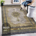 Carpets A beautiful, intricately designed carpet with a mix of gold and gray tones, adding a touch of elegance to any room