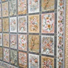 Carpets A beautiful, intricately designed carpet with a mix of flowers and trees
