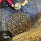 Carpets A person sits on a beautiful, intricately designed carpet, surrounded by books and a cup of coffee, with a rug in