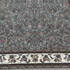 Carpets A beautiful, intricately designed carpet with a gray and white color scheme, featuring a floral pattern and a border