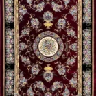 Carpets A luxurious red carpet with intricate gold and floral patterns