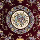 Carpets A beautiful, intricately designed carpet with a central floral pattern and surrounding flowers and leaves, set