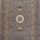 Carpets A beautiful, intricately designed carpet with a central floral pattern and a border of flowers and leaves, made of a