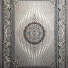 Carpets A large, intricately patterned rug with a central medallion and a border of similar design
