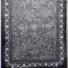 Carpets A large, dark grey rug with a white, intricate pattern