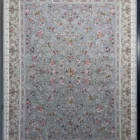 Carpets A large, light gray carpet with a floral pattern