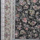 Carpets A beautiful, intricately designed carpet with a black background and a floral pattern in various colors